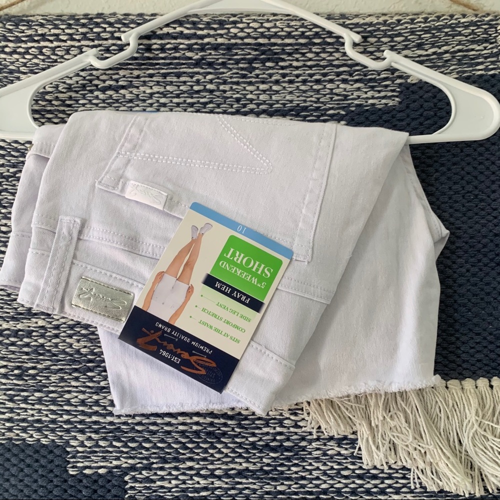 White shorts with frayed bottom